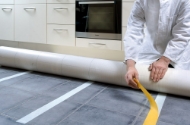 Afbeeldingen van Tesa dubbelz. vloerbedekkingstape 25m, 50mm